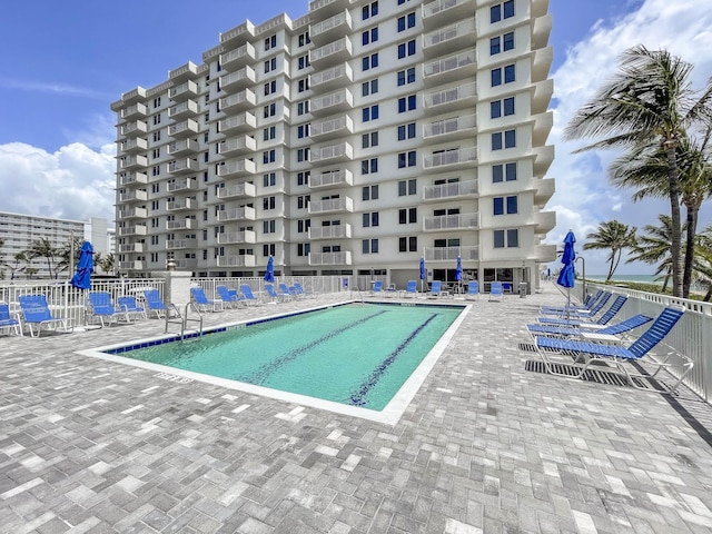 3221 S Ocean Blvd Unit 501, Highland Beach, FL 33487 - community pool with a patio area
