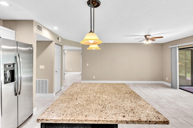 5610 Coach House Cir Unit C, Boca Raton, FL 33486 - kitchen featuring stainless steel fridge with ice dispenser, a textured ceiling, a ceiling fan, light tile patterned floors, and hanging light fixtures