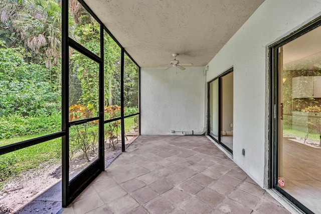 5610 Coach House Cir Unit C, Boca Raton, FL 33486 - unfurnished sunroom with ceiling fan and plenty of natural light
