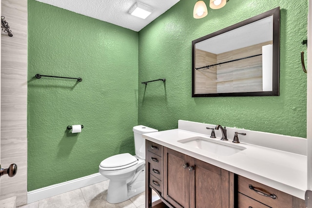 5610 Coach House Cir Unit C, Boca Raton, FL 33486 - bathroom with a textured wall, vanity, tile patterned flooring, a textured ceiling, and a shower
