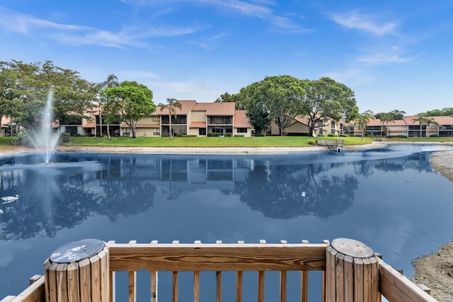 5610 Coach House Cir Unit C, Boca Raton, FL 33486 - view of swimming pool featuring a water view and a residential view