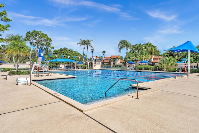 5610 Coach House Cir Unit C, Boca Raton, FL 33486 - community pool featuring a patio area