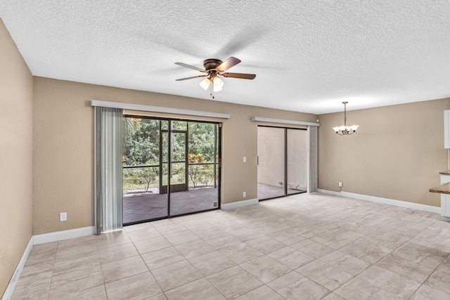 5610 Coach House Cir Unit C, Boca Raton, FL 33486 - unfurnished room featuring a ceiling fan, a chandelier, a textured ceiling, and light tile patterned floors