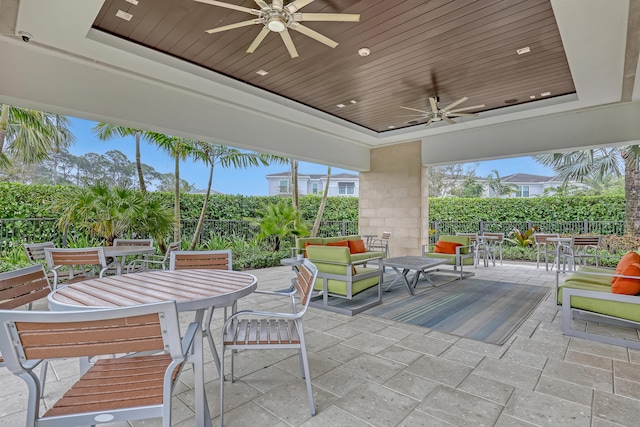 13501 Artisan Cir, Palm Beach Gardens, FL 33418 - view of patio / terrace featuring outdoor dining space and ceiling fan