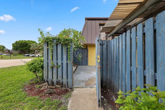 3665 Silver Lace Ln Unit 80, Boynton Beach, FL 33436 - gate with a lawn