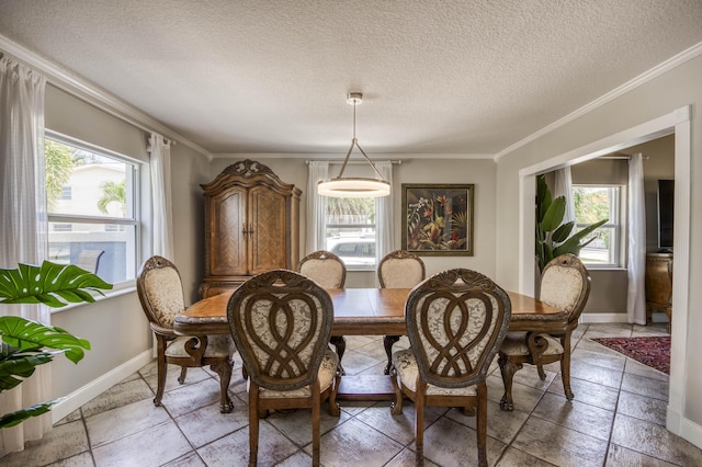 130 S Ocean Breeze, Lake Worth Beach, FL 33460 - dining room with ornamental molding and a textured ceiling
