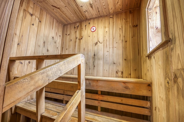 130 S Ocean Breeze, Lake Worth Beach, FL 33460 - staircase featuring a sauna, wood walls, and wood ceiling