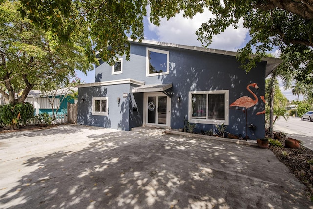 130 S Ocean Breeze, Lake Worth Beach, FL 33460 - view of front of house with stucco siding