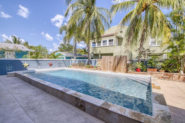 130 S Ocean Breeze, Lake Worth Beach, FL 33460 - view of pool with a fenced backyard and a patio