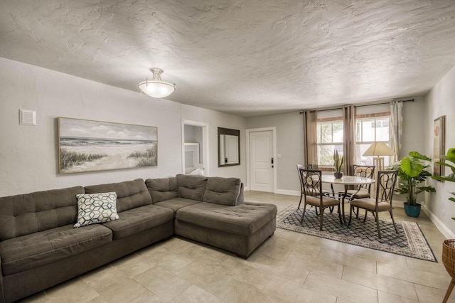 130 S Ocean Breeze, Lake Worth Beach, FL 33460 - living room featuring a textured ceiling
