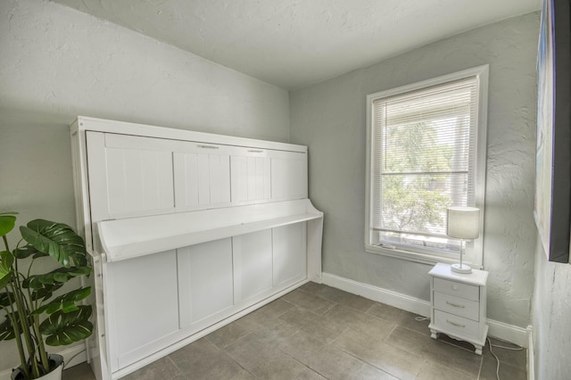 130 S Ocean Breeze, Lake Worth Beach, FL 33460 - interior space featuring baseboards and a textured wall