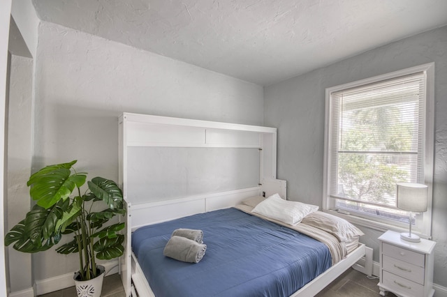 130 S Ocean Breeze, Lake Worth Beach, FL 33460 - bedroom featuring baseboards and tile patterned flooring