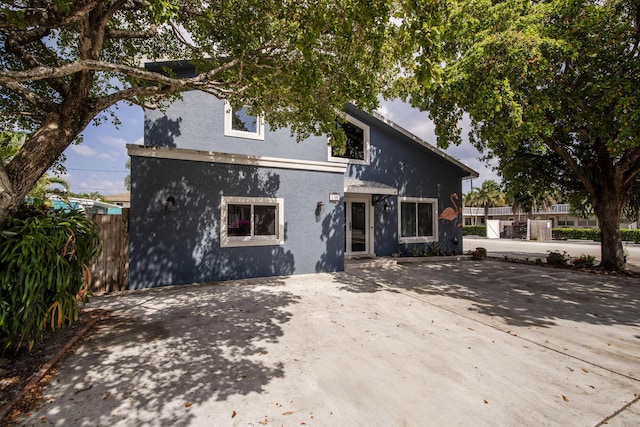 130 S Ocean Breeze, Lake Worth Beach, FL 33460 - view of front of house with stucco siding and a patio area