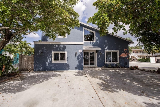130 S Ocean Breeze, Lake Worth Beach, FL 33460 - view of front of property featuring stucco siding and french doors