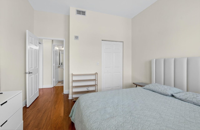 233 S Federal Hwy Unit Uph04, Boca Raton, FL 33432 - bedroom with dark wood-style floors and a closet