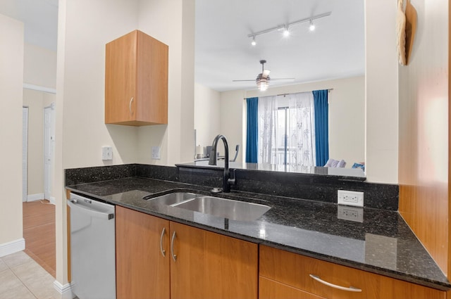 233 S Federal Hwy Unit Uph04, Boca Raton, FL 33432 - kitchen featuring dishwashing machine, dark stone countertops, rail lighting, and a ceiling fan