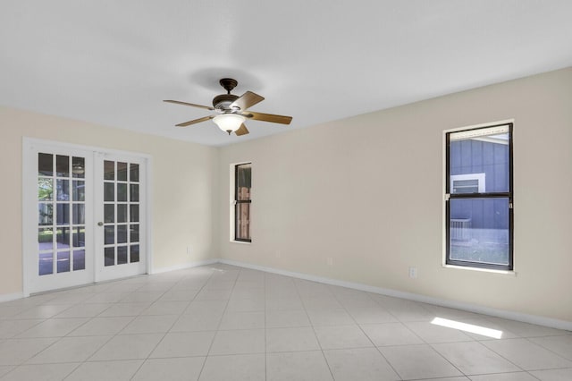 2774 SE Howell Ave, Port Saint Lucie, FL 34952 - spare room featuring french doors and a ceiling fan