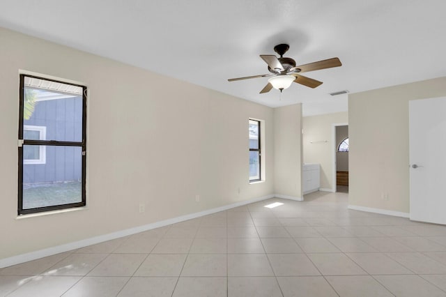 2774 SE Howell Ave, Port Saint Lucie, FL 34952 - spare room with ceiling fan and light tile patterned flooring