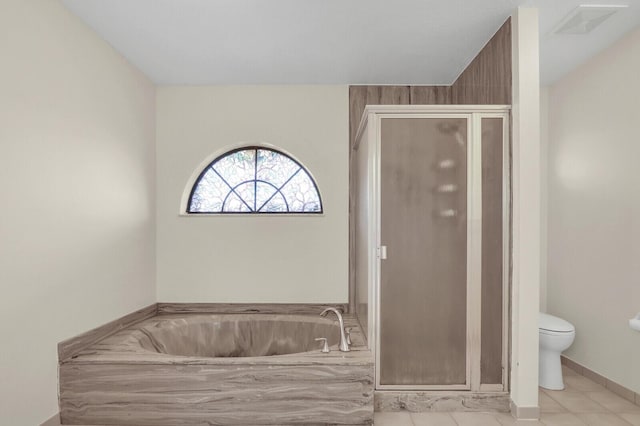 2774 SE Howell Ave, Port Saint Lucie, FL 34952 - full bath with a stall shower, a garden tub, and tile patterned floors