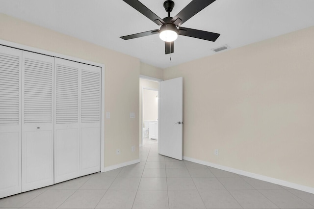 2774 SE Howell Ave, Port Saint Lucie, FL 34952 - unfurnished bedroom featuring a closet and a ceiling fan