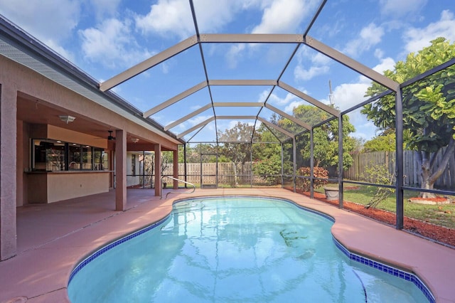 2774 SE Howell Ave, Port Saint Lucie, FL 34952 - view of pool with a fenced backyard, a patio area, ceiling fan, and a lanai