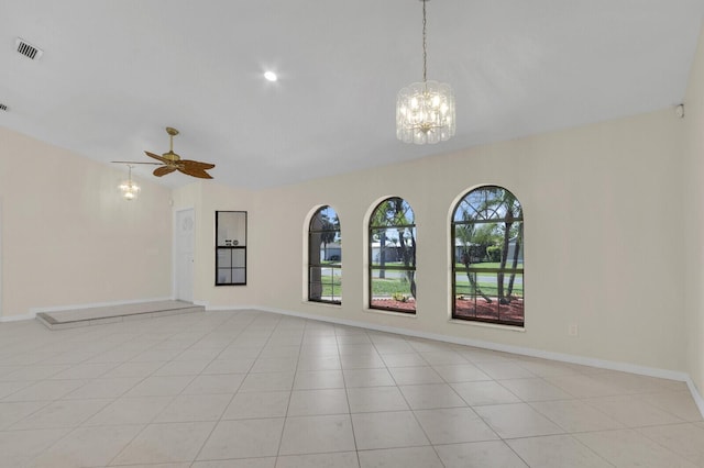 2774 SE Howell Ave, Port Saint Lucie, FL 34952 - empty room with a chandelier and a ceiling fan