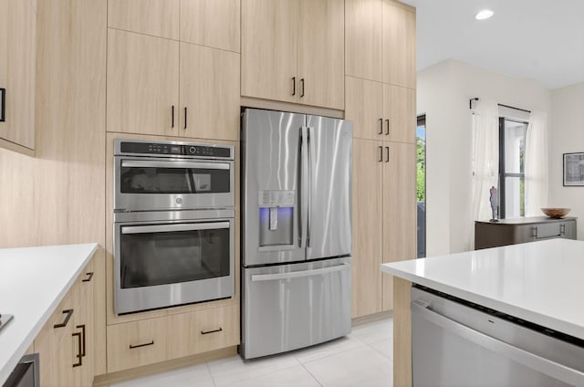 8516 Swinley Forest Way, Boca Raton, FL 33434 - kitchen with stainless steel appliances, light brown cabinetry, light countertops, and modern cabinets