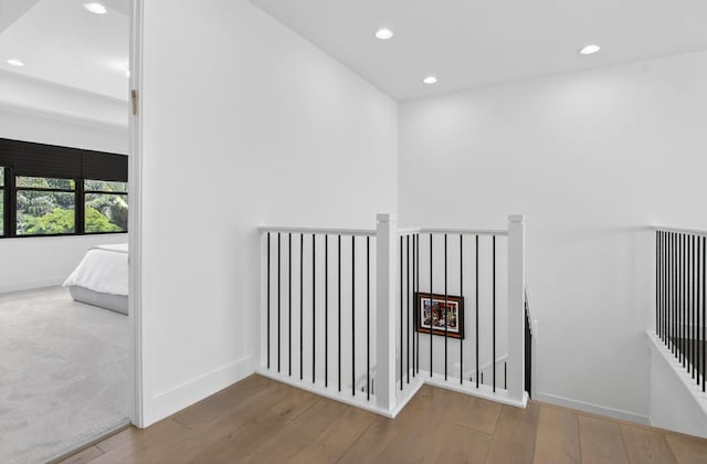 8516 Swinley Forest Way, Boca Raton, FL 33434 - hall with an upstairs landing, recessed lighting, and wood finished floors