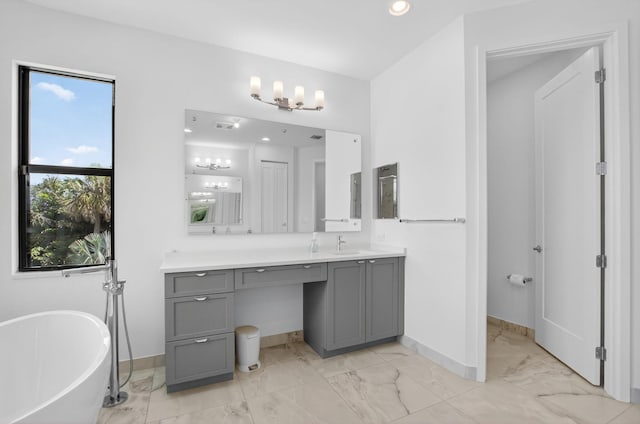 8516 Swinley Forest Way, Boca Raton, FL 33434 - full bath with vanity, a freestanding tub, marble finish flooring, recessed lighting, and a chandelier