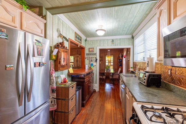 1016 N E St, Lake Worth Beach, FL 33460 - kitchen featuring appliances with stainless steel finishes, dark wood-style floors, wood ceiling, dark countertops, and crown molding