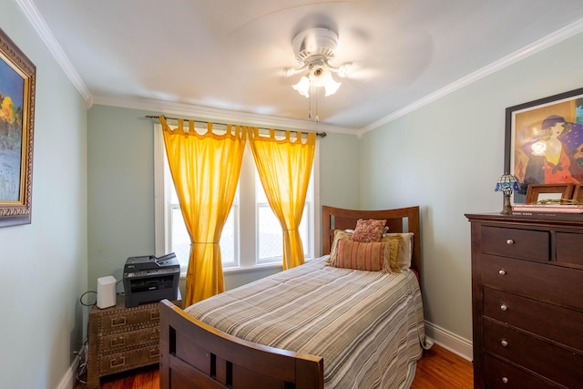1016 N E St, Lake Worth Beach, FL 33460 - bedroom with crown molding and dark wood-style floors