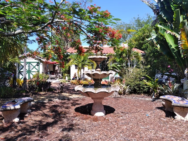 1016 N E St, Lake Worth Beach, FL 33460 - view of yard featuring a storage unit