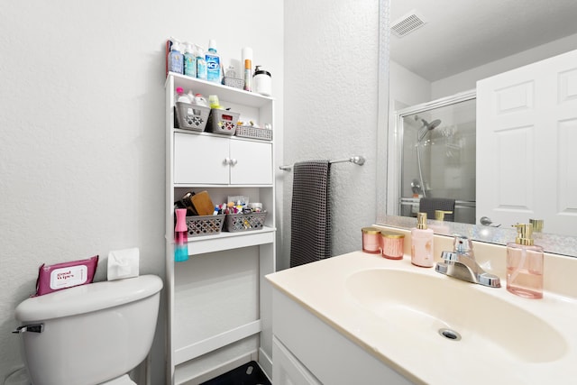 1947 Gardenia Ct, Riviera Beach, FL 33404 - bathroom with vanity, a stall shower, and a textured wall