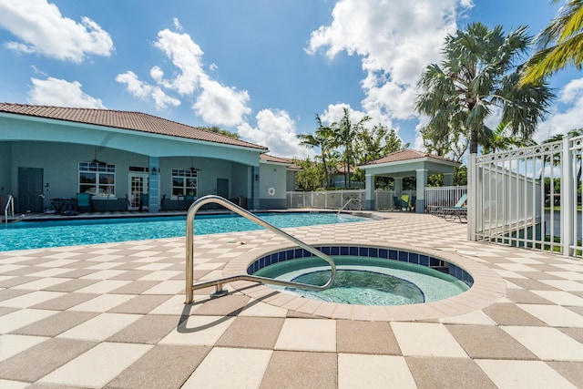 1947 Gardenia Ct, Riviera Beach, FL 33404 - community pool featuring a community hot tub, a patio area, and a gazebo