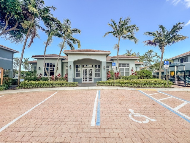 1947 Gardenia Ct, Riviera Beach, FL 33404 - view of building exterior featuring uncovered parking