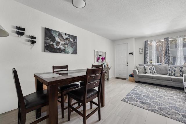 1947 Gardenia Ct, Riviera Beach, FL 33404 - dining space with a textured ceiling