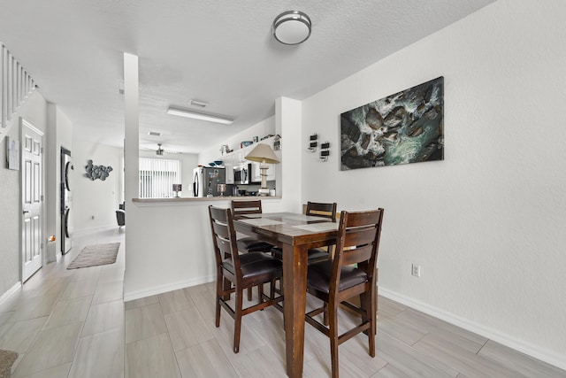 1947 Gardenia Ct, Riviera Beach, FL 33404 - dining space with baseboards and ceiling fan