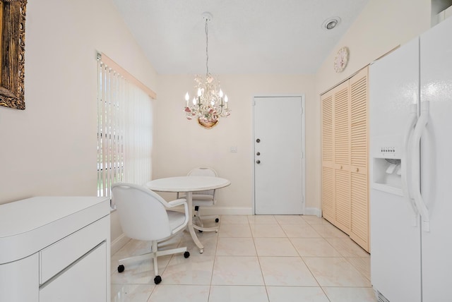 8368 Sunmeadow Ln, Boca Raton, FL 33496 - dining area featuring a chandelier and light tile patterned floors