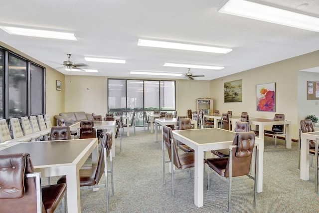 6855 W Broward Blvd Unit 406, Plantation, FL 33317 - dining area with carpet and ceiling fan