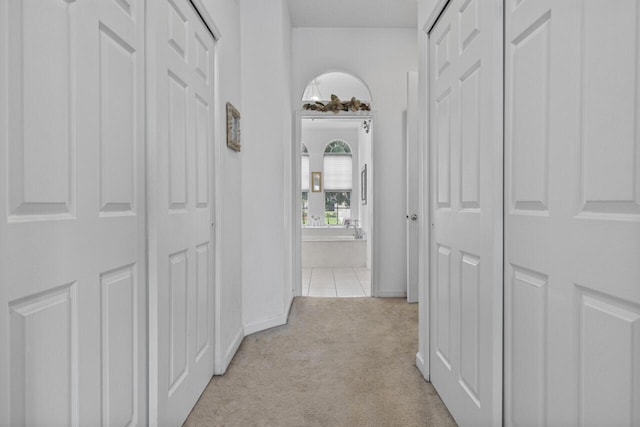 1267 SW Briarwood Dr, Saint Lucie West, FL 34986 - hallway with light colored carpet and baseboards