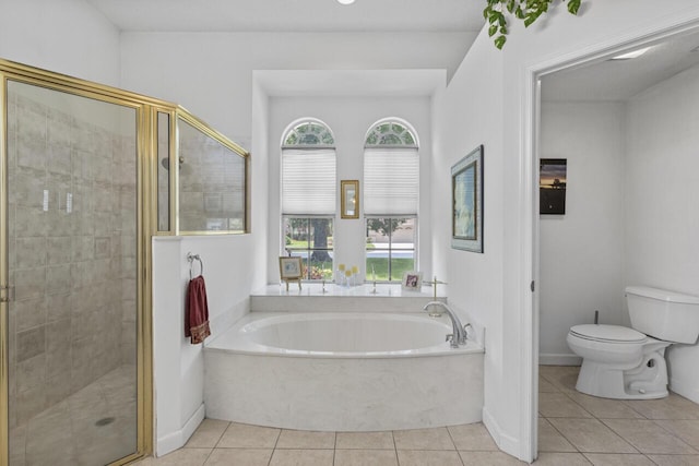 1267 SW Briarwood Dr, Saint Lucie West, FL 34986 - bathroom featuring a garden tub, tile patterned floors, and a shower stall