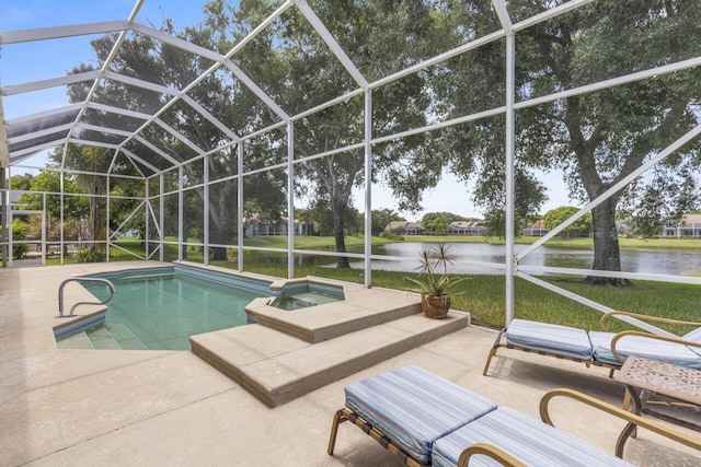 1267 SW Briarwood Dr, Saint Lucie West, FL 34986 - view of pool with a water view, a patio, a pool with connected hot tub, and a yard