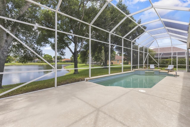 1267 SW Briarwood Dr, Saint Lucie West, FL 34986 - view of pool featuring a water view, a patio, a lawn, a pool with connected hot tub, and a lanai
