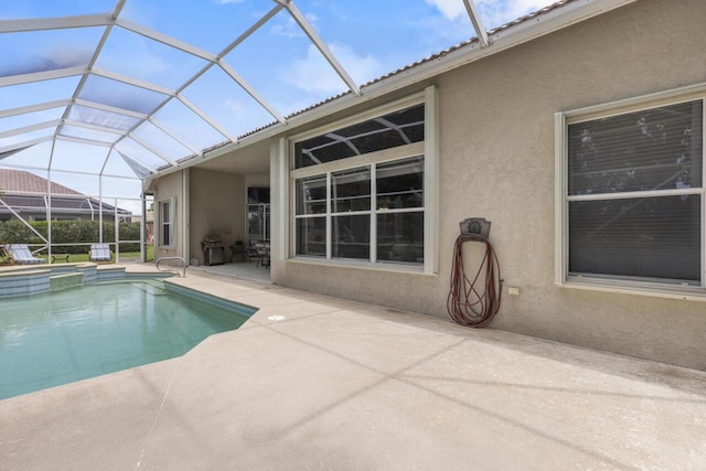 1267 SW Briarwood Dr, Saint Lucie West, FL 34986 - view of pool featuring a patio, glass enclosure, and a pool with connected hot tub