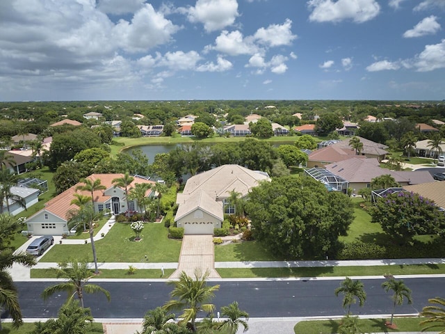 1267 SW Briarwood Dr, Saint Lucie West, FL 34986 - aerial perspective of suburban area with a large body of water