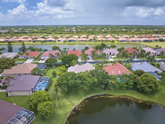 1267 SW Briarwood Dr, Saint Lucie West, FL 34986 - aerial perspective of suburban area with a large body of water