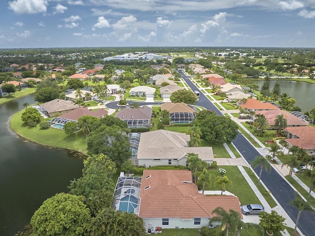 1267 SW Briarwood Dr, Saint Lucie West, FL 34986 - aerial perspective of suburban area with a large body of water