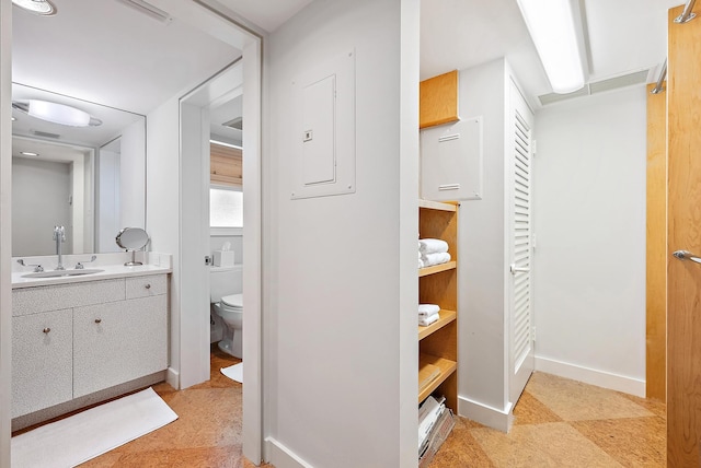 2 Church Ln Unit 115, North Palm Beach, FL 33408 - bathroom with vanity and tile patterned floors