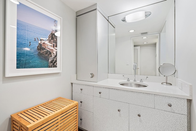 2 Church Ln Unit 115, North Palm Beach, FL 33408 - bathroom featuring vanity and recessed lighting