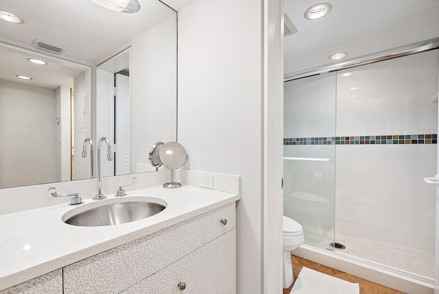 2 Church Ln Unit 115, North Palm Beach, FL 33408 - full bathroom with a stall shower, vanity, recessed lighting, and tile patterned floors